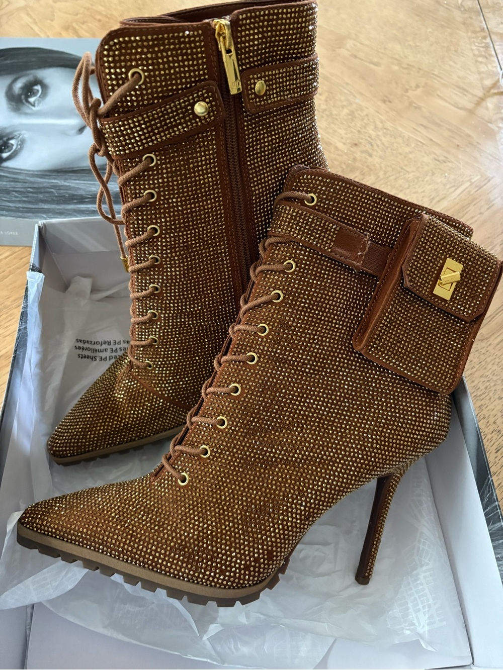JLO Rhinestone Studded Pointed-Toe Lace-Up High Heel Booties in Brown
